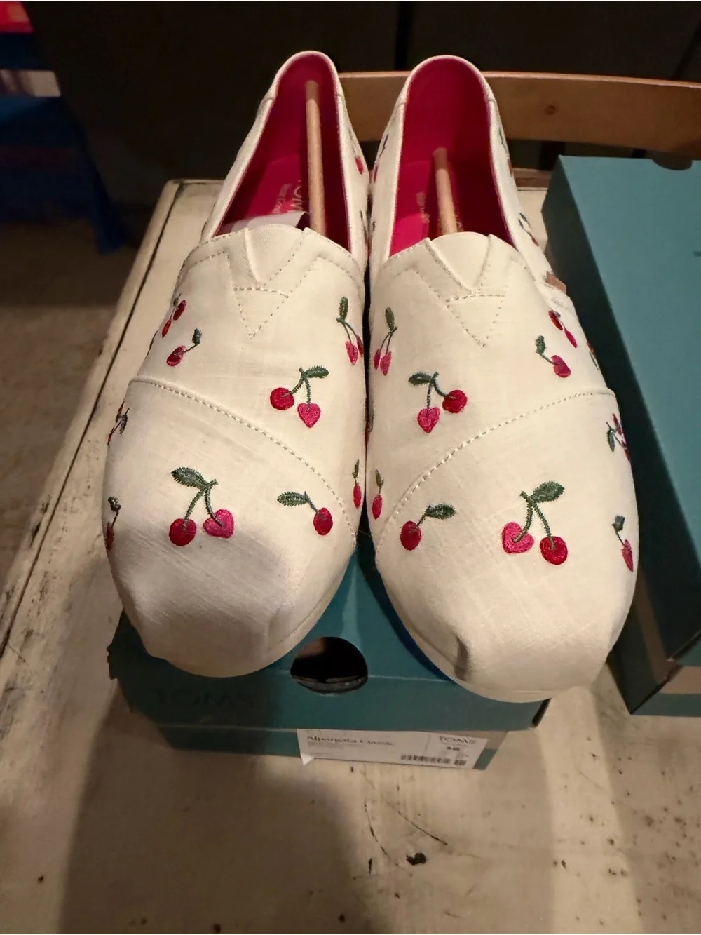 Toms White Slip-On Flats with Red Cherry Embroidery- NWT. Size 12M